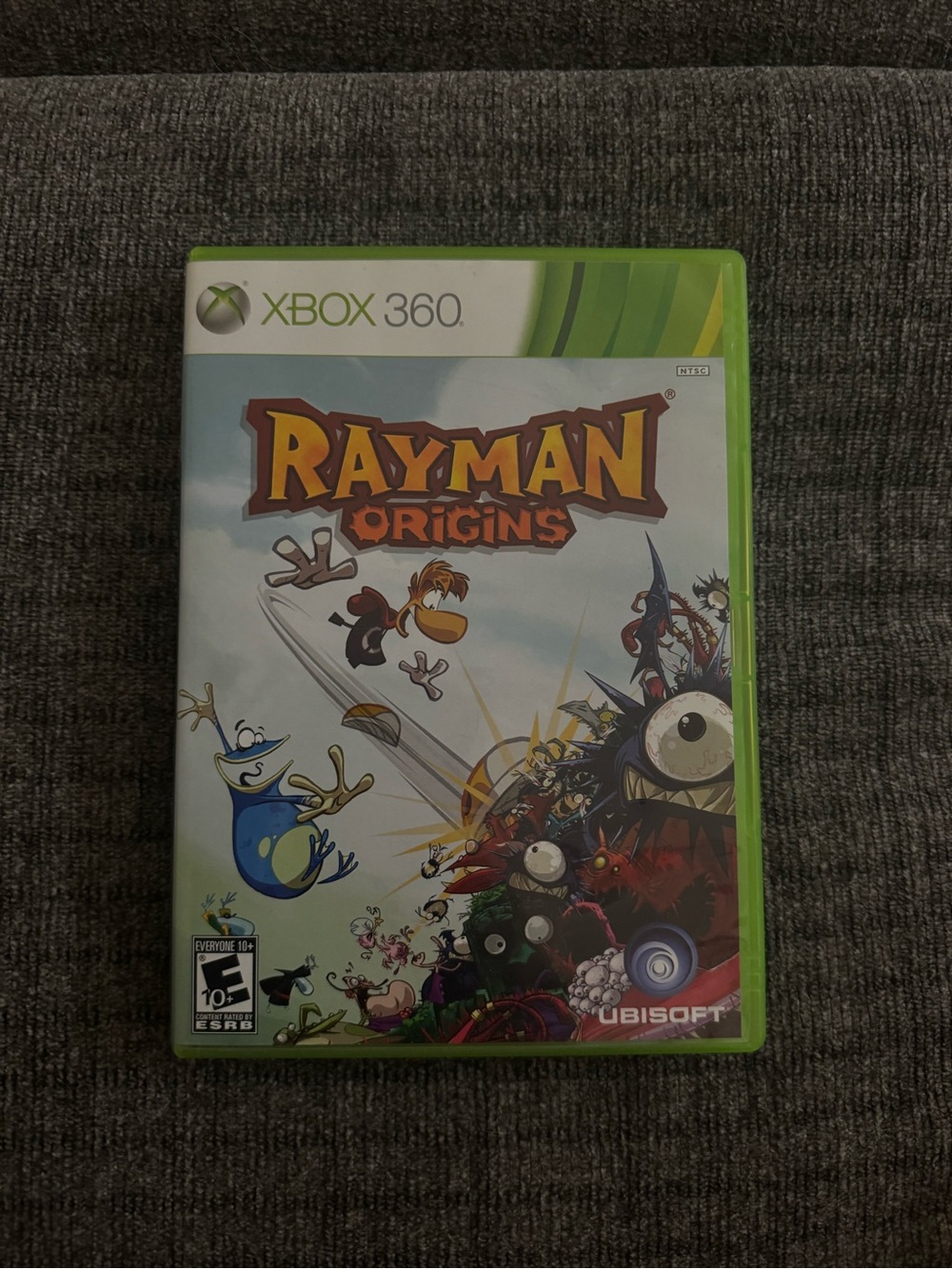 Rayman Origins (Xbox 360) - Green Case by Ubisoft